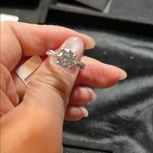 Round Cubic Zirconia Twist Band Ring in Silver